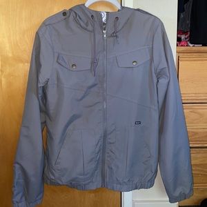 Gray windbreaker jacket